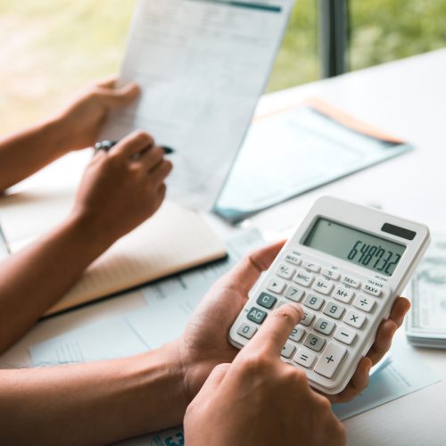 couples and men and women are together analyzing expenses or finances in deposit accounts